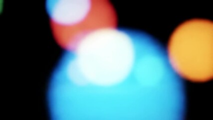 Aufkleber - Abstract animation, colorful light orbs float and blur, creating hypnotic, dynamic visual effect.  Represents energy, movement, dreamlike state, vibrant atmosphere