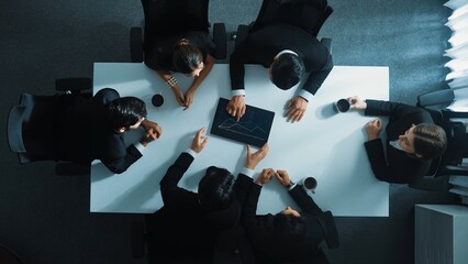 Poster - Top down aerial view of group of business people looking at financial chart while analyze and explain growing stock market statistic. Team placed tablet with chart at meeting table. Directorate.