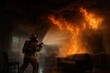 © Vadim Pushenko - A firefighter battling flames in a smoky, burning room while spraying water.