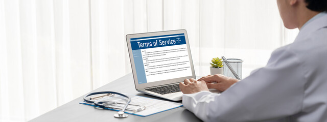 Poster - Online term of service conditions showing brisk rules and regulations in using the website on device screen for users to make an agreement to the online term of service