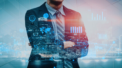 Fototapete - A businessman in a suit stands confidently with crossed arms against a digital city background. Data visualizations and graphs illustrate growth and analysis in a futuristic environment. Xenic