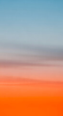 Poster - Smooth gradient of blue, gray, orange hues, resembling a sunset sky, evokes serenity, calmness and tranquility, ideal for background design