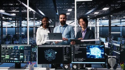Poster - Portrait of smiling engineers in data center code with generative AI assistance. Happy IT experts doing brainstorming, leveraging artificial intelligence large language model to solve tasks, camera A
