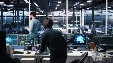 Poster - Programmer entering server room office, using AI to review infrastructure diagnostics. IT admin in data center high tech facility analyzes performance data using artificial intelligence tech, camera A