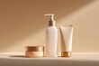 © The Little Hut - Elegant minimalist skincare set with a pump bottle cream jar and facial cleanser tube in neutral beige tones with soft lighting