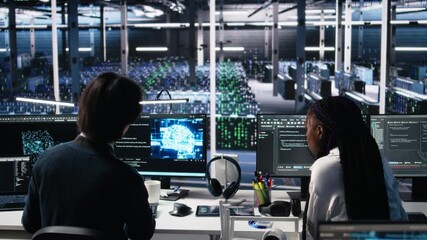 Poster - Data center admins doing brainstorming, working on neural network software development. Server farm IT employees working together, implementing machine learning technology using PC, camera A
