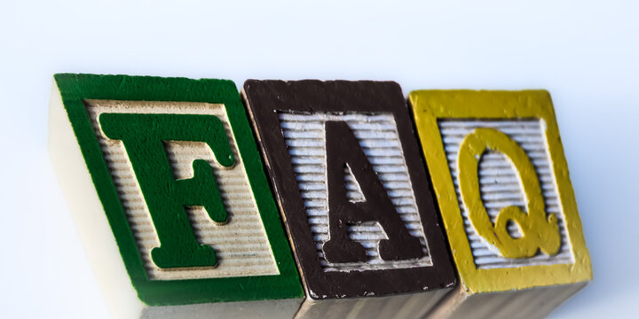 FAQ design element with copy space at an angle. Color building blocks for Frequently Asked Questions. Website retro background or banner.