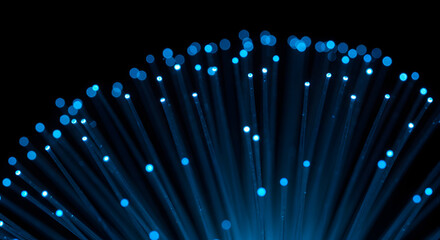 Poster - Ethereal Blue Fiber Optics Radiating Light on Black Background in a Modern Technological Display of Telecommunications