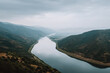 © Stefan - breathtaking view of reservoir edge in iran under overcast sky captured from topdown perspective