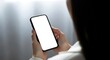 © MdNazim - Person holding blank screen smartphone white screen
