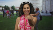 © Krakenimages.com - Middle age hispanic woman extends bare hand forward in pisa tower plaza; invitation connection travel.