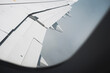 © yaqui_villegas - Wing of airplane seen through fogged window during ascent, atmospheric conditions and white tones dominating the view, abstract concept of flight and altitude.