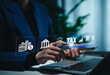 © Sandwish - Tax Planning and Financial Compliance Concept. Businessperson points to tax icon on with finance, calendar, and audit symbols representing tax processes. state taxes, documents, reports, taxation,