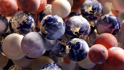 Poster - Shiny spheres representing earth, mars, moon and other planets are slowly falling together on a black background, creating a mesmerizing cosmic dance