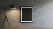 © Dual Studio - Small black picture frame with grey edging, hanging on concrete background. Mock up, 3D Render