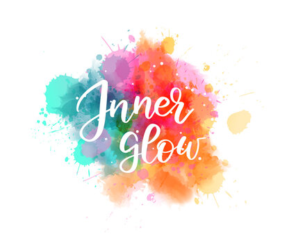 Inner glow - handwritten modern calligraphy text on watercolor paint splash.