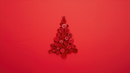 Poster - Small decorative tree made of red buttons placed on a red background