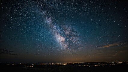 Wall Mural - bright milky way stretching across a textured nighttime landscape