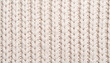 © Väike Studio - Natural Rib Knit Wool Pattern. Textile Surface. Close up Texture. Background. Yarn.