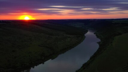Wall Mural - Aerial drone footage of awesome colorful sunrise over Dniester river. Ukraine, Europe.