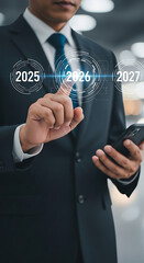 Poster - Businessman Selecting 2026 on Futuristic Interface