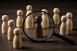 © Blind  - A magnifying glass focuses on a dark-skinned wooden figure among lighter-skinned ones, symbolizing the importance of diversity and inclusion in selection processes. Generated AI