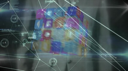Poster - Suited man raising palm and summoning app icons forming spinning 3D cube illustrating network
