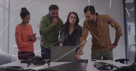 Poster - Four coworkers collaborating on drone project as woman in blazer typing design file on laptop