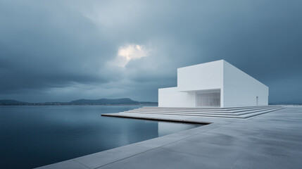 Aufkleber - Minimalist white architectural structure by the sea, cloudy sky