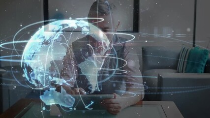 Poster - Senior man tapping tablet in lounge and generating tech holographic globe for studying data rings