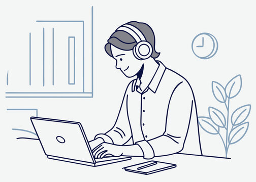 Person wearing headphones using laptop and notebook