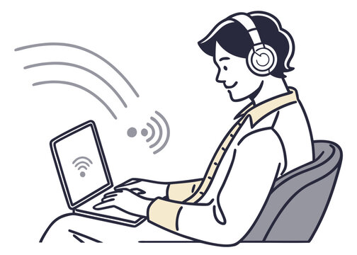 Person wearing headphones using laptop with wifi signal
