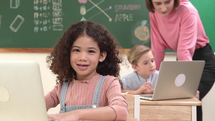 Poster - Attractive girl coding prompt while looking at camera at STEM class while happy teacher checking smart boy software program. Diverse student study about programing code and computing system. Pedagogy.