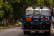 © AlfRibeiro - Truck carrying flammable gas cylinders in an urban area in Brazil. Illustrates challenges and risks of transporting hazardous materials.