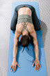 © zphoto83 - Stretching and relaxing in child pose during a yoga session in a calm indoor setting for wellness and mindfulness