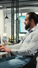 Poster - Vertical Video Professional consultant reviewing financial data forecast on pc screen, developing innovative business solutions for alignment with enterprise objectives. Corporate industry strategy