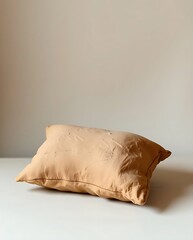 Poster - A Cozy Neutral Pillow on a White Surface for Minimalist Home Decor Aesthetic