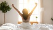 © StocksJust4You - Beautiful young woman waking up in cozy white bedding, stretching with a smile as warm morning sunlight pours through a large window, embracing a peaceful new day