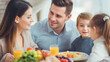 © Mselected - Family enjoys breakfast together at home on a sunny morning
