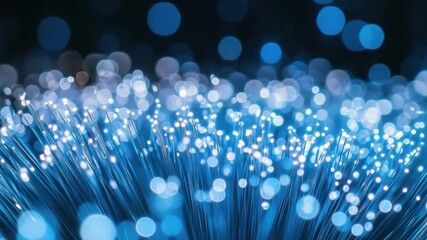 Poster - Abstract Blue Light Particles on Dark Background Creating a Dreamy Atmosphere with Depth and Motion Effects