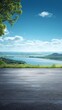 © DeepView - Asphalt Road Overlooking Lake and Hill Landscape