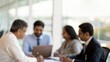 © N7 - Indian Board Members Engaged in Blurred Background Strategic Discussion