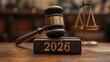 © syhin_stas - Wooden judge gavel with engraved 2026 on wooden stand as symbol of justice, law and legal system, representing court decisions, legal trends and justice concepts for New Year 2026 banner