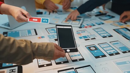 Poster - A creative team collaborates on user interface design, showcasing mobile and desktop mockups during a modern technology workshop focused on innovation and teamwork. SACTR