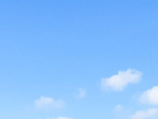 Wall Mural - Soft white clouds with a beautiful blue sky in the morning light. Soft white clouds float in the clear blue sky. Clear blue sky, bright spring, soft sky gradient.
