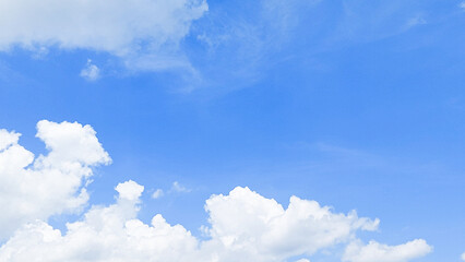 Wall Mural - Bright white cumulus clouds floating in a clear blue summer sky. Blue sky with clouds. Soft white clouds float in the clear blue sky. Clear blue sky, bright spring, wallpaper landscape.
