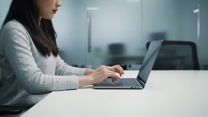 Poster - Woman typing laptop modern office, focused professional using technology for business productivity contemporary workspace, demonstrating concentration, remote work, digital communication