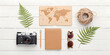 © Faysal - Flat lay travel essentials with camera passport and sunglasses