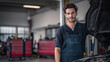 © 打算 朱 - Mechanic standing next to an open car hood in a well-lit garage