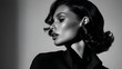© utaem2022 - Fashion model posing with elegant hairstyle and makeup in black and white